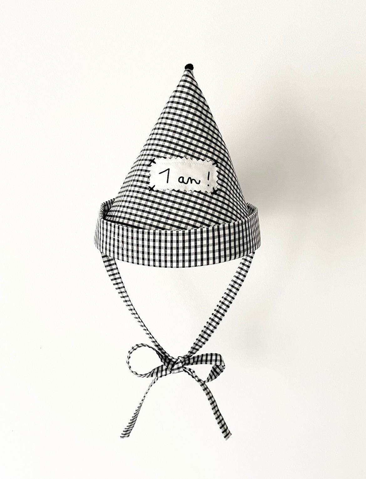 Chapeau pointu d'anniversaire carreaux noirs