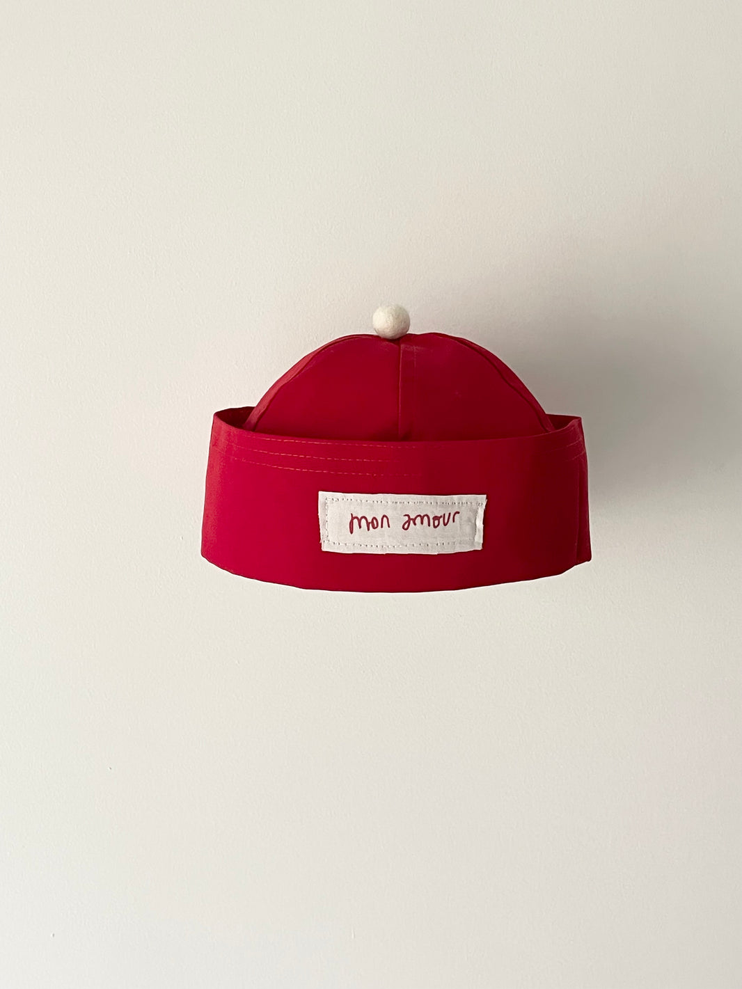 Chapeau marin rayé rouge cerise