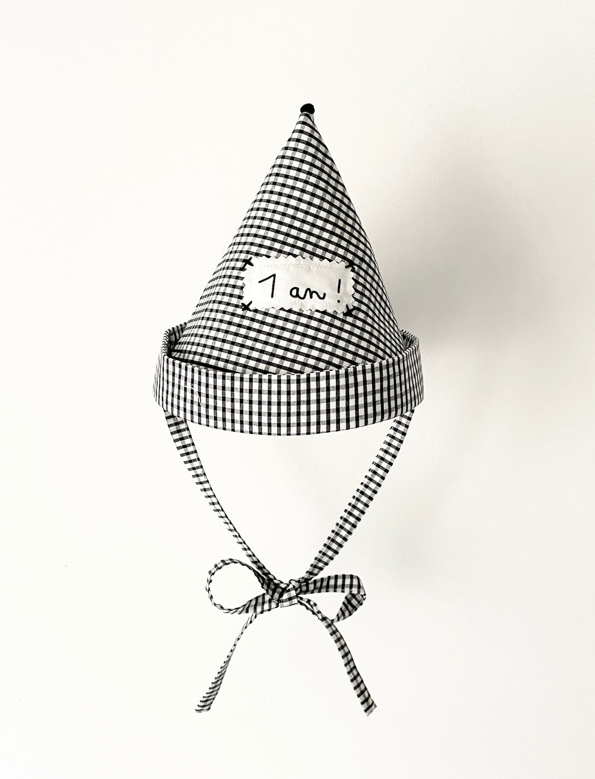 Pointed birthday black checkered hat